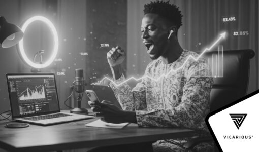 A Digital creator using laptop and smartphone with social media analytics and rising revenue charts on screen, symbolizing audience growth and monetization.”